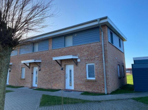 Ferienhaus in Tossens mit Garten